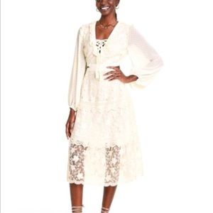 Beautiful cut out dress by ALEXIS.Size S. NWT.